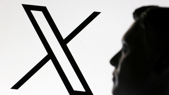 FILE PHOTO: Illustration shows 3D-printed miniature model of Elon Musk and X logo